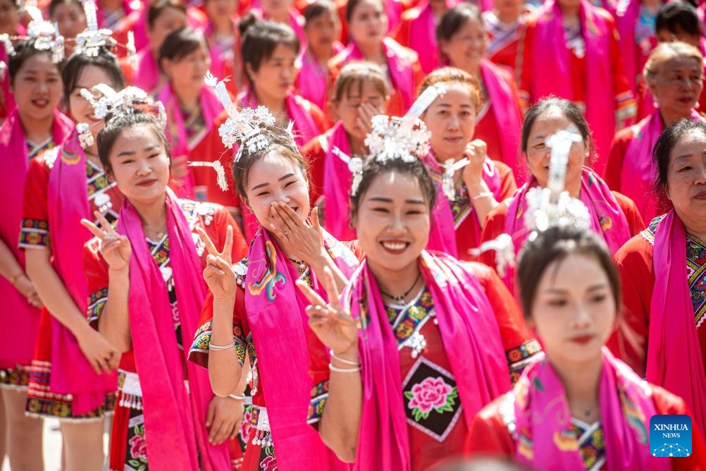 People from the Miao ethnic group celebrate the Caihuashan festival in Chiyou Jiuli Town of Pengshui Miao-Tujia Autonomous County, southwest China's Chongqing, May 15, 2024. The Caihuashan festival is a traditional Miao festival which derives from courtship rituals, where young people meet and make acquaintance by singing and dancing together. The festival celebrations have become increasingly popular in recent years with the development of local tourism and the promotion of Miao ethnic cultures.(Photo: Xinhua)