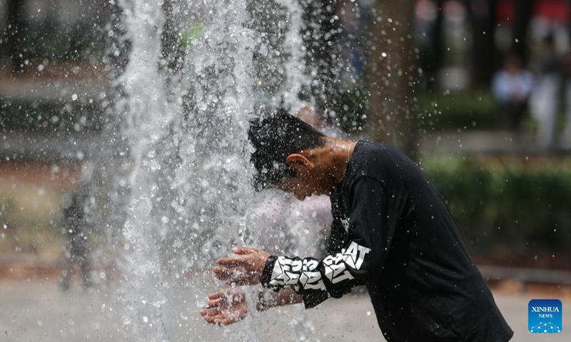 A man refreshes himself at a fountain in Mexico City, Mexico, on May 15, 2024. According to the National Meteorological Service of Mexico, the new round of heat wave ends this week but temperature will remain above 40 degree Celsius in many states. (Photo: Xinhua)