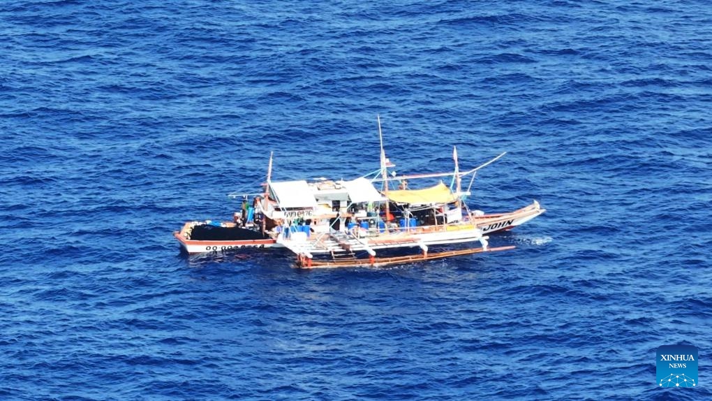 An aerial drone photo taken on May 16, 2024 shows one of several Philippine ships gathering illegally and conducting activities irrelevant to legitimate fishing in the surrounding waters of Huangyan Dao. The China Coast Guard (CCG) are intensifying monitoring and evidence collection concerning these ships.(Photo: Xinhua)