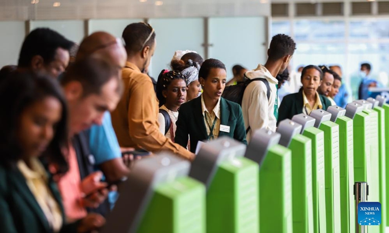 People check in at the newly-built domestic passenger terminal at Bole International Airport in Addis Ababa, Ethiopia, on May 18, 2024. Ethiopian Airlines, Africa's largest and fastest-growing airline, inaugurated a Chinese-built domestic passenger terminal in Addis Ababa, the Ethiopian capital, on Saturday. Photo: Xinhua