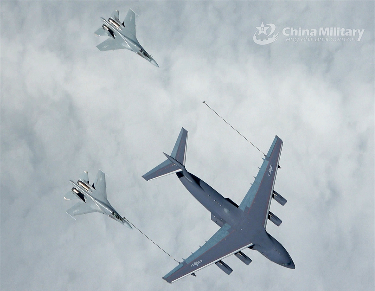 A YY-20 tanker attached to an aviation brigade under the PLA Air Force refuels two J-16 fighter jets during an aerial refueling training exercise in early May, 2024. (eng.chinamil.com.cn/Photo by Zhan Peng)