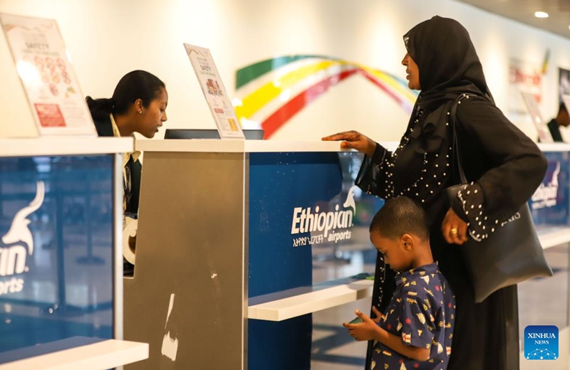 People check in at the newly-built domestic passenger terminal at Bole International Airport in Addis Ababa, Ethiopia, on May 18, 2024. Ethiopian Airlines, Africa's largest and fastest-growing airline, inaugurated a Chinese-built domestic passenger terminal in Addis Ababa, the Ethiopian capital, on Saturday. Photo: Xinhua