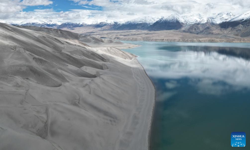 An aerial drone photo taken on May 19, 2024 shows a view of the Baisha Lake scenic area in Akto County, northwest China's Xinjiang Uygur Autonomous Region. May 19 marks the China Tourism Day.(Photo: Xinhua)