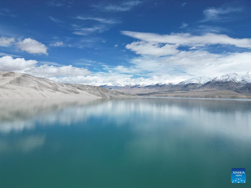 An aerial drone photo taken on May 19, 2024 shows a view of the Baisha Lake scenic area in Akto County, northwest China's Xinjiang Uygur Autonomous Region. May 19 marks the China Tourism Day.(Photo: Xinhua)