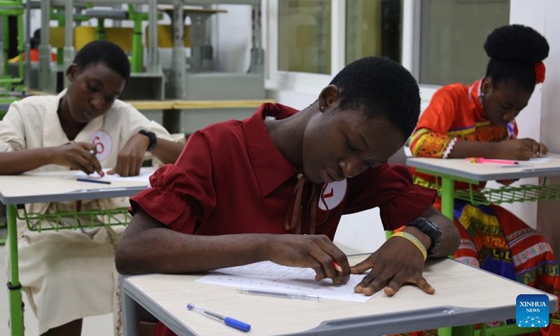 Contestants participate in a written exam in the national qualification for the 17th Chinese Bridge, a Chinese language competition for foreign secondary school students, in Accra, Ghana, on May 24, 2024. (Photo:Xinhua)