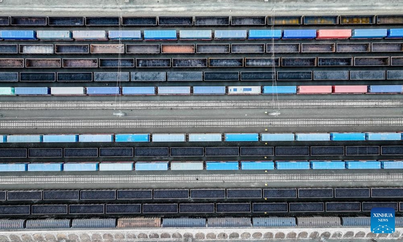 An aerial drone photo taken on May 24, 2024 shows China-Europe freight trains at a station yard of Suifenhe Railway Port in northeast China's Heilongjiang Province. Suifenhe Railway Port is an important port for the operation of China-Europe freight trains in northeast China. Staff members here are trying their best to reduce the average time for loading and grouping of these trains. (Photo:Xinhua)