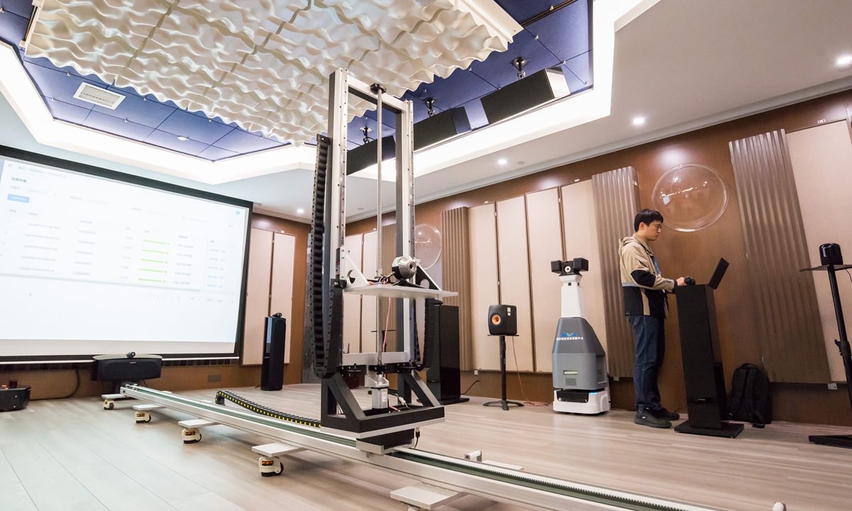 A staff member operates a robot at National Intelligent Voice Innovation Center in Hefei, East China's Anhui Province, on June 17, 2024. Photo: Chen Tao/GT 
