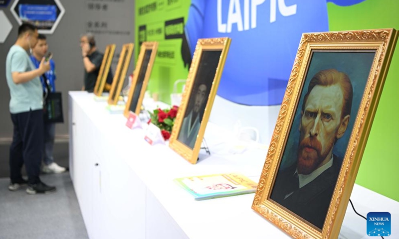 AI picture frames are on display during the 20th China (Shenzhen) International Cultural Industries Fair (ICIF) in Shenzhen, south China's Guangdong Province, May 24, 2024. The 20th ICIF opened on Thursday in the southern Chinese metropolis of Shenzhen. The fair will showcase new business forms and new applications through the combination of multimedia such as AI and AR. (Photo: Xinhua)