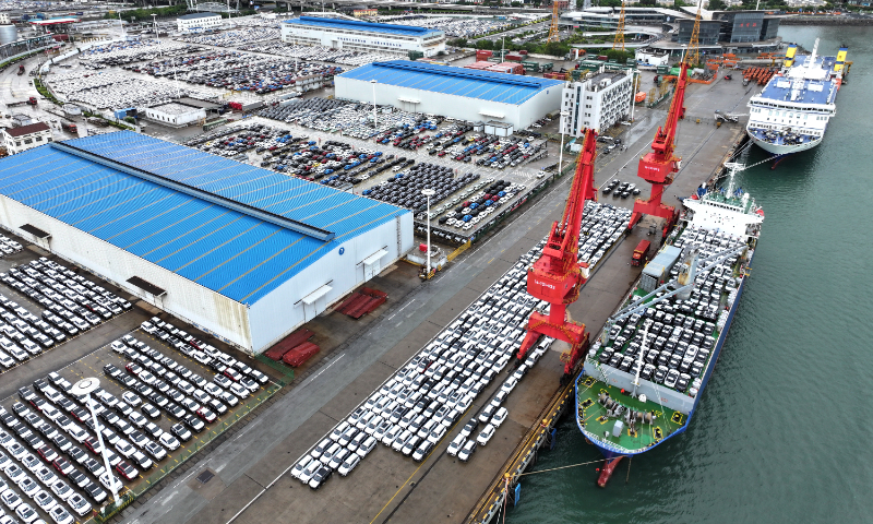 Passenger cars for export are loaded onto a roll-on/roll-off (ro-ro) ship at a terminal in Lianyungang, East China's Jiangsu Province, on July 7, 2024. According to the latest data, China exported 2.446 million cars in the first five months of 2024, up 26.6 percent year-on-year, with export value reaching $46.43 billion, up 19.9 percent. Photo: VCG