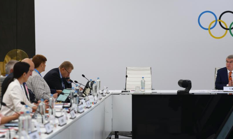 International Olympic Committee (IOC) President Thomas Bach (R) delivers a speech during the IOC Executive Board meeting in Paris, July 20, 2024. (Kai Pfaffenbach/Reuters/Pool via Xinhua)