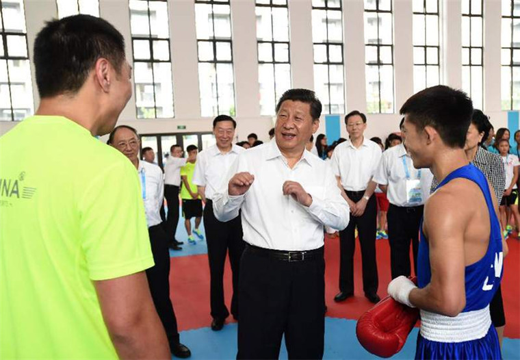 Chinese President Xi Jinping visits the Youth Olympic Village in Nanjing, East China’s Jiangsu Province on August 15, 2014. Photo: Xinhua