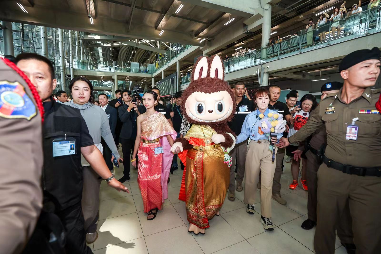 Fans greet LABUBU at the Suvarnabhumi Airport in Bangkok, Thailand on July 1. 