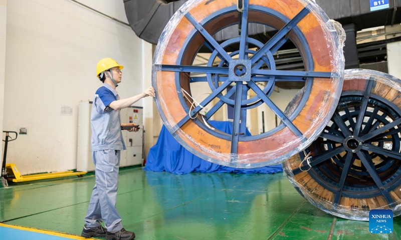 A staff member works at a factory of CHINT Group in Songjiang District of east China's Shanghai, May 23, 2024. (Photo: Xinhua)