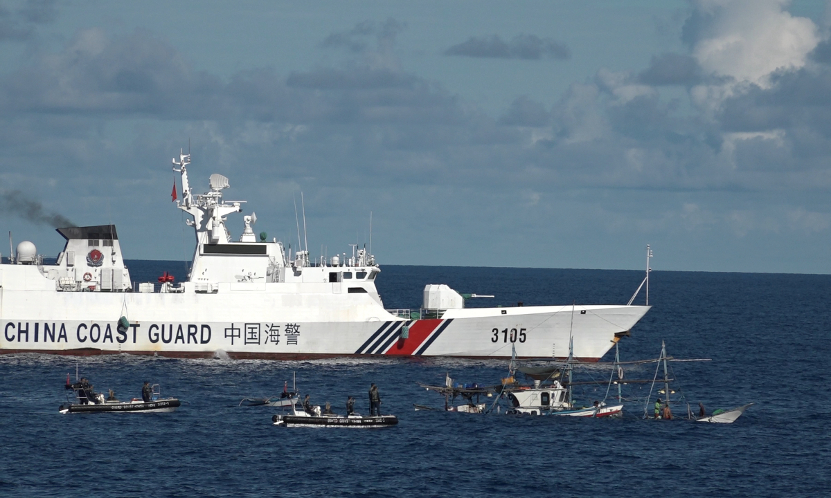 A China Coast Guard (CCG) vessel in patrol helps rescue a Philippine fishing boat in distress in the waters near China's Huangyan Dao, also known as Huangyan Island, in the South China Sea on June 29, 2024. Photo: Courtesy of China Coast Guard