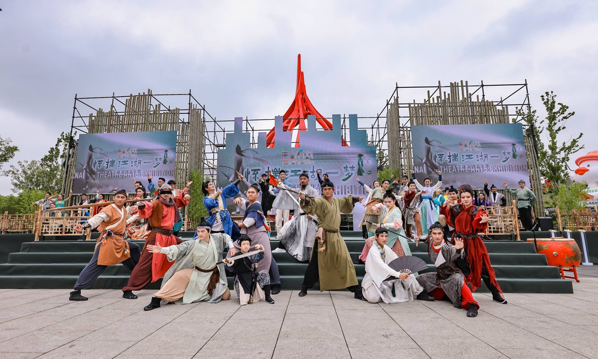 Actors and actresses perform at the opening ceremony. Photo: Courtesy of the exhibition