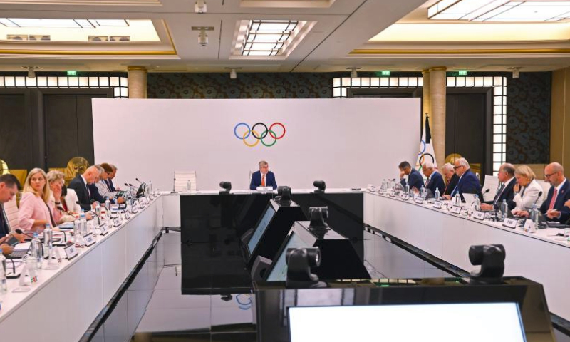 International Olympic Committee (IOC) President Thomas Bach (C) delivers a speech during the IOC Executive Board meeting in Paris, July 20, 2024. (Kai Pfaffenbach/Reuters/Pool via Xinhua)