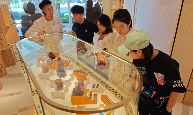 The first LV chocolate store in China, located in Pudong New Area, Shanghai, attracts many customers who are lining up to enter and make purchases on July 23, 2024. Photo: VCG