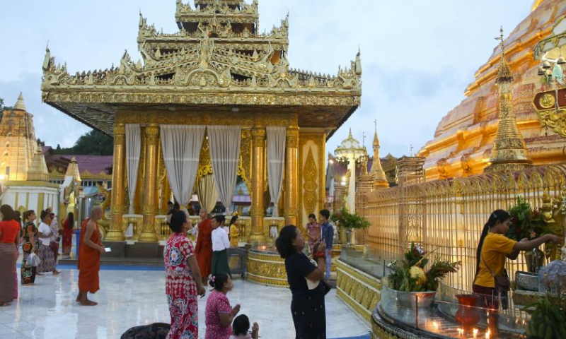 People visit the Botahtaung Pagoda during celebrations of the full moon day of Warso in Yangon, Myanmar, July 20, 2024. (Photo by Myo Kyaw Soe/Xinhua)