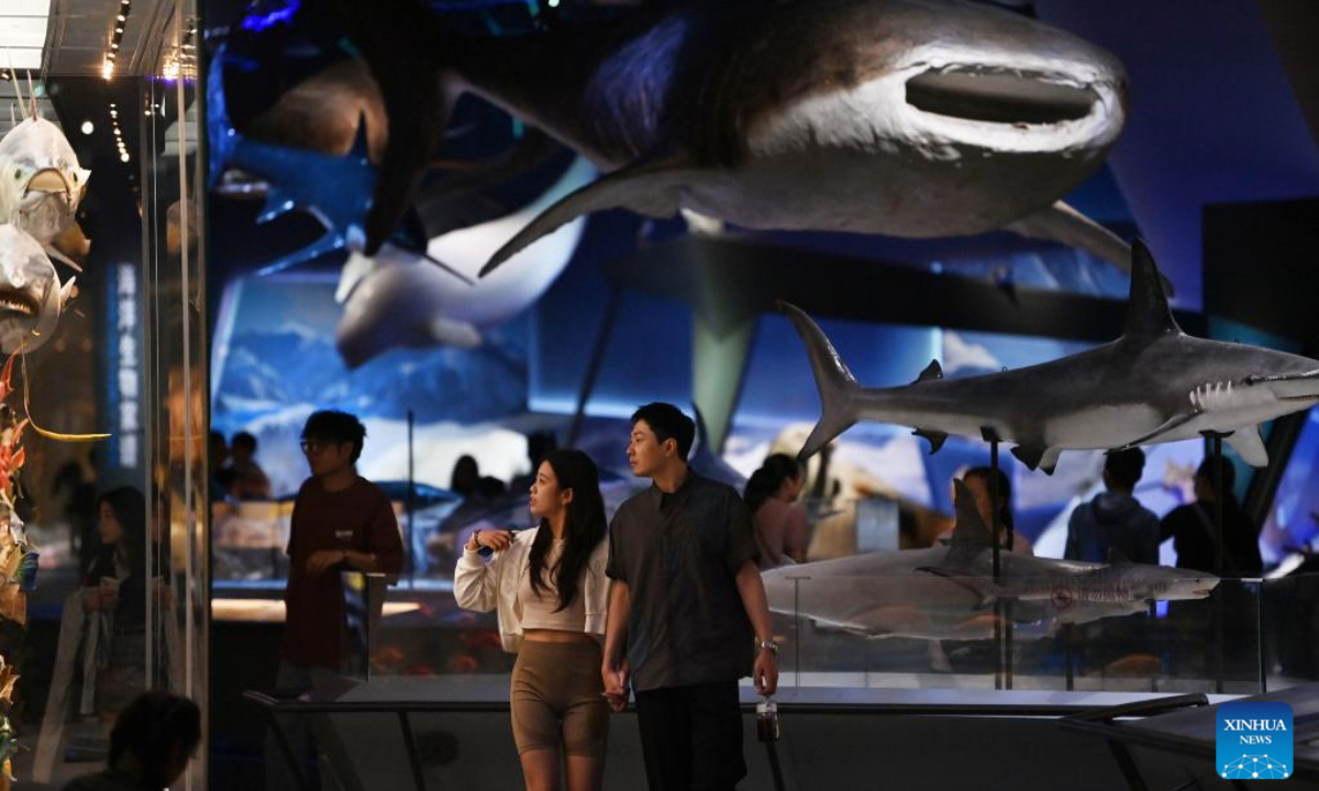 People visit the National Maritime Museum of China in Tianjin, north China, June 28, 2024. The National Maritime Museum of China is located in Tianjin Binhai New Area, covering an area of 15 hectares. As the summer vacation approaches, the number of visitors to the museum has increased. (Photo: Xinhua)