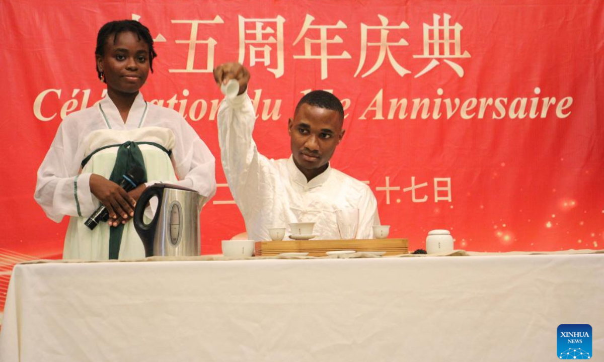 Student demonstrates Chinese tea art during the 15th anniversary of the Confucius Institute of the University of Abomey-Calavi at Chinese Cultural Center in Cotonou, Benin, June 27, 2024. (Photo: Xinhua)