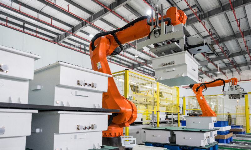 A robotic arm produces battery packs for ships at Zigui Green Intelligent Ship Industrial Park in Zigui, Central China's Hubei Province, on May 22, 2024. Photo: Chen Tao/GT