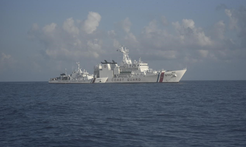 The photo taken on May 3, 2024 shows the Philippine ships 4402 and 9701 are transferring supplies in the waters of China's Xianbin Jiao. Photo: China Coast Guard