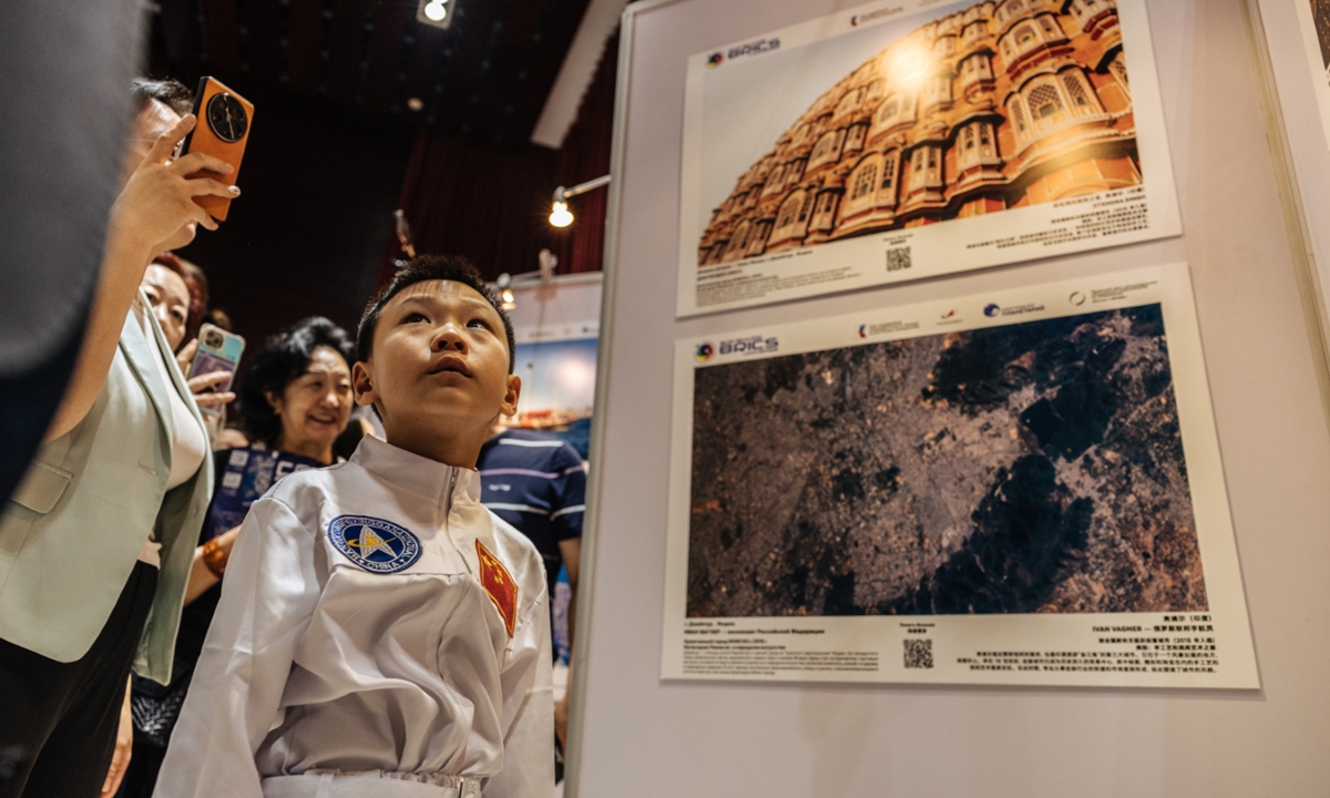 Visitors explore <em>The BRICS Universe</em> exhibition in Beijing on May 29, 2024. Photo: Li Hao/GT