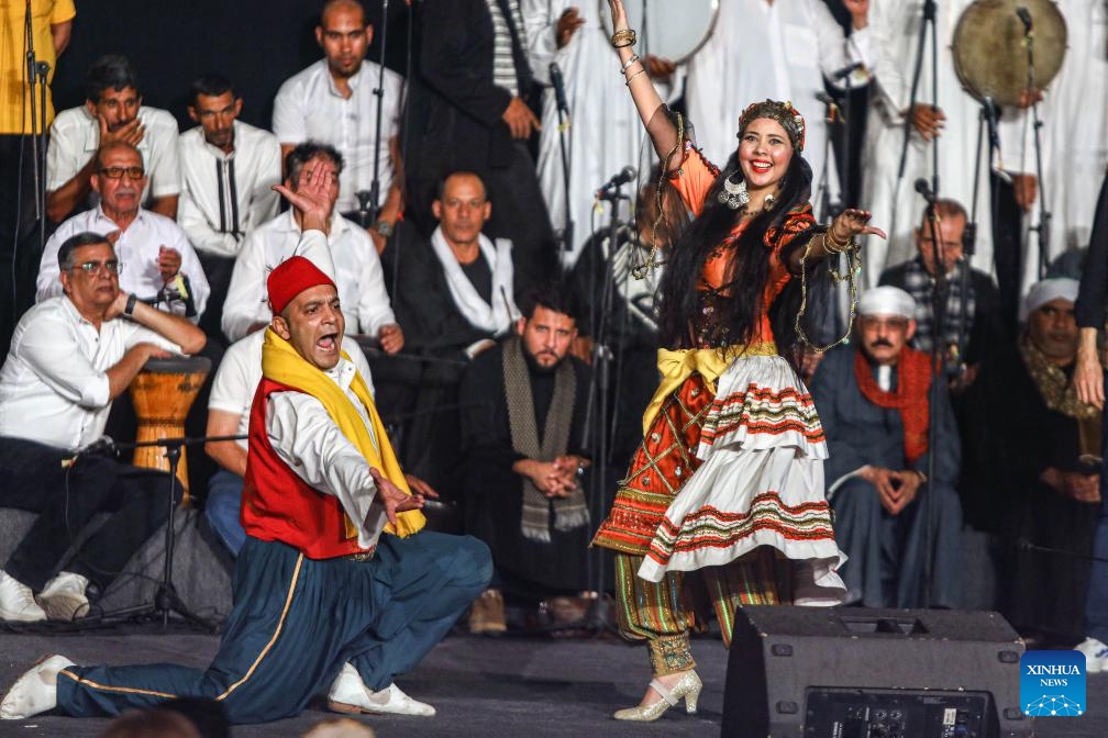 Artists perform at the opening of the 11th International Festival for Drums and Traditional Arts in Cairo, Egypt, on May 26, 2024. Egypt's 11th International Festival for Drums and Traditional Arts kicked off here on Sunday night, attracting participants from 30 countries and regions.(Photo: Xinhua)