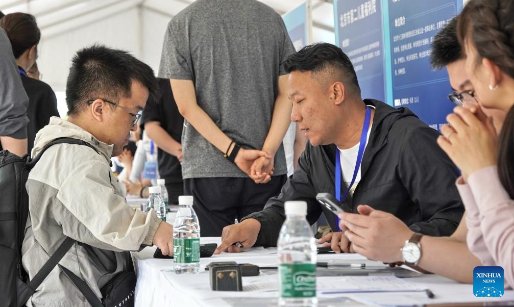 A job seeker attends a job fair dedicated to persons with disabilities in Beijing, capital of China, May 27, 2024. By the end of 2023, the employment rate for persons with disabilities of working age in Beijing had reached 68.5 percent.(Photo: Xinhua)