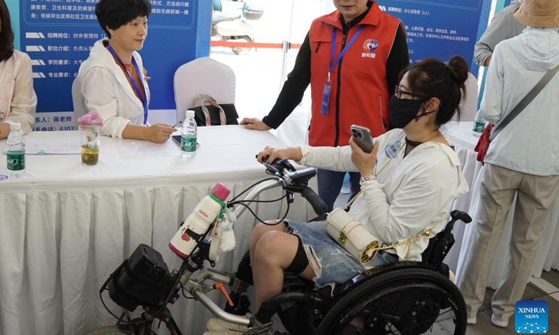 A job seeker attends a job fair dedicated to persons with disabilities in Beijing, capital of China, May 27, 2024. By the end of 2023, the employment rate for persons with disabilities of working age in Beijing had reached 68.5 percent.(Photo: Xinhua)