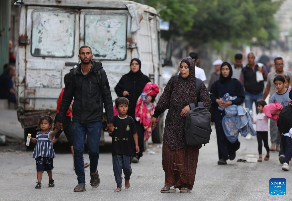 Palestinians flee from home in the southern Gaza Strip city of Rafah, on May 28, 2024. The United Nations Relief and Works Agency for Palestine Refugees said on social media platform X that nearly one million people were forced to flee from Rafah during the past three weeks, as a result of the Israeli bombing of the city.(Photo: Xinhua)