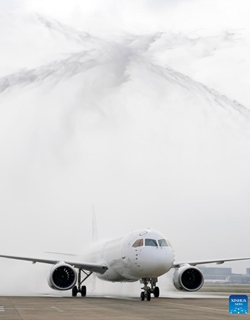 A C919 jetliner carrying more than 100 Hong Kong young talents receives a ceremonial water salute on its arrival at the Shanghai Hongqiao International Airport in Shanghai, east China, June 1, 2024. A C919 jetliner of the China Eastern Airlines fleet on Saturday kicked off its first overseas commercial chartered flight, providing a round-trip service between Shanghai and Hong Kong. (Photo: Xinhua)