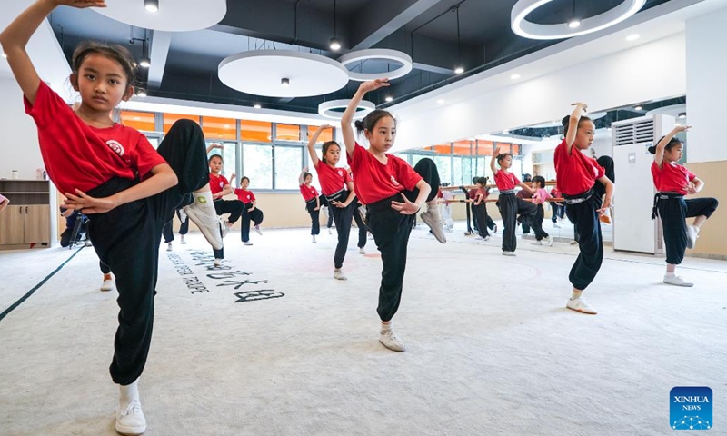 Pupils take a Kunqu Opera training class at Shipai Center Primary School of Kunshan in Kunshan City, east China's Jiangsu Province, May 26, 2024. (Photo: Xinhua)