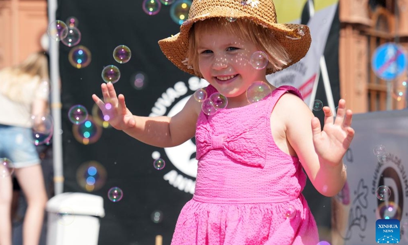 A child is seen during an event to mark the International Children's Day at the Dome Square in Riga, Latvia, June 1, 2024. The International Children's Day was celebrated in Riga on Saturday.  (Photo: Xinhua)