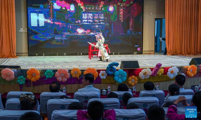 Xie Suqian, a pupil of the little Kunqu Opera training class of Shipai Center Primary School, performs Kunqu Opera in Kunshan City, east China's Jiangsu Province, May 31, 2024. (Photo: Xinhua)