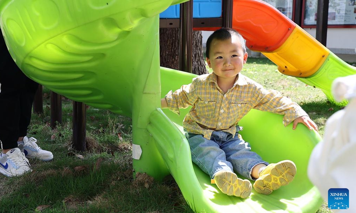 A boy plays at a Community Based Family Support (CBFS) center in Aijia Village, Yichang City of central China's Hubei Province, April 23, 2024. (Photo: Xinhua)