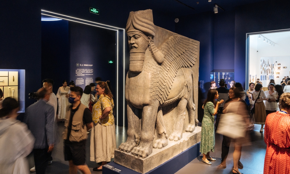 Visitors explore the <em>Salvaged from the Shadows: Protecting Cultural Heritage</em> exhibiton at the National Museum of China in Beijing on June 6, 2024. Photo: Li Hao/GT