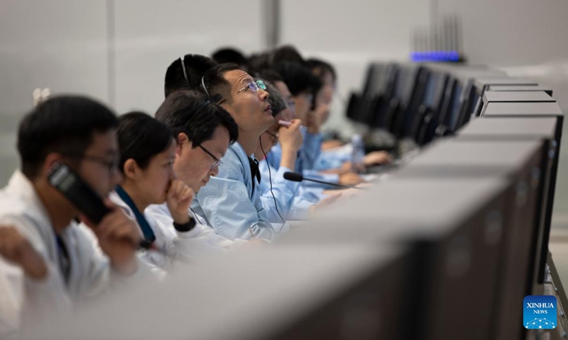 Technical personnel work at the Beijing Aerospace Control Center (BACC) in Beijing, capital of China, June 2, 2024. China's Chang'e-6 touched down on the far side of the moon on Sunday morning, and will collect samples from this rarely explored terrain for the first time in human history, the China National Space Administration (CNSA) announced. (Photo: Xinhua)