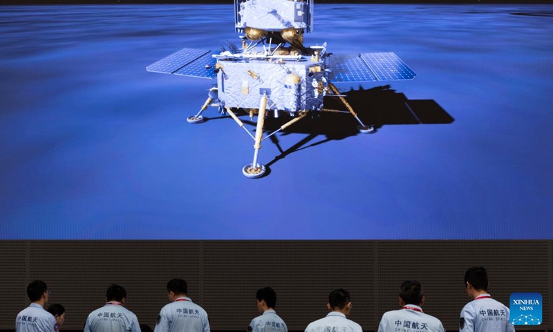 Technical personnel view data sent back by the lander-ascender combination of Chang'e-6 probe at the Beijing Aerospace Control Center (BACC) in Beijing, capital of China, June 2, 2024. China's Chang'e-6 touched down on the far side of the moon on Sunday morning, and will collect samples from this rarely explored terrain for the first time in human history, the China National Space Administration (CNSA) announced. (Photo: Xinhua)