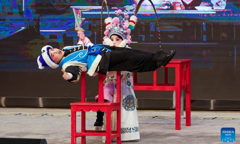 Zhang Zixuan (front) and Xie Suqian, two pupils of the little Kunqu Opera training class of Shipai Center Primary School, perform Kunqu Opera in Kunshan City, east China's Jiangsu Province, May 31, 2024. (Photo: Xinhua)