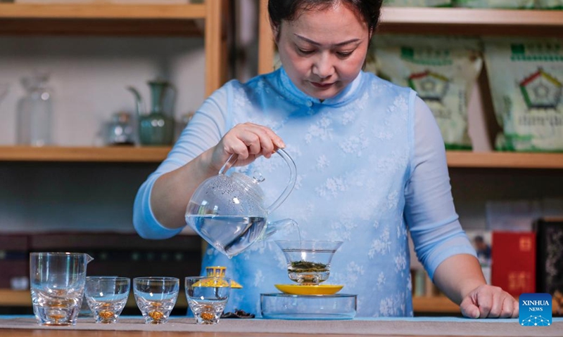 Wang Sun makes tea at Demingshe, a tea art vocational training school in Huangshan City, east China's Anhui Province, May 23, 2024. (Photo: Xinhua)