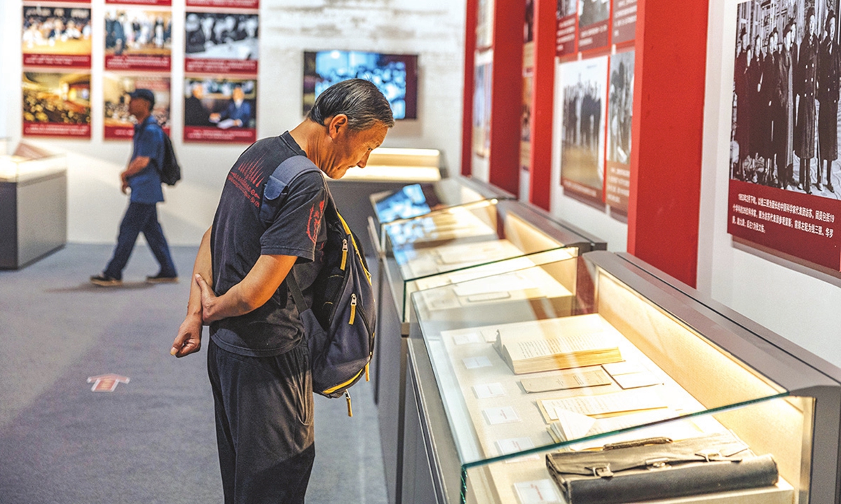 A visitor studies exhibits at the National Museum for Modern Chinese Scientists in Beijing on Thursday. Photo: Li Hao/GT