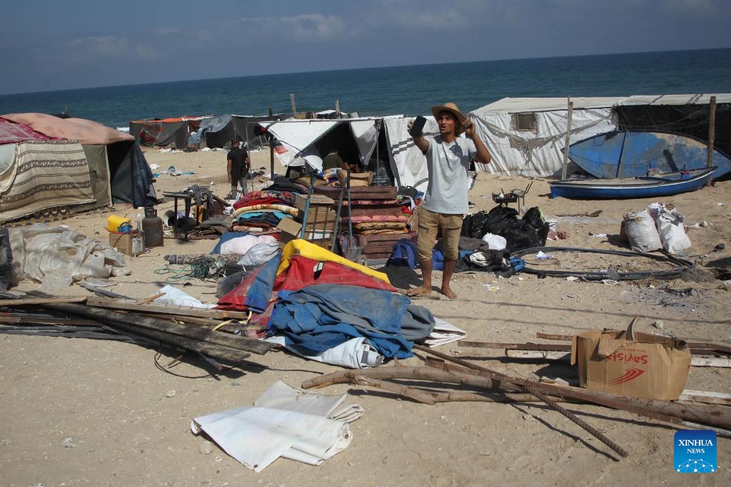 Palestinians who fled from Rafah are seen at a coast in the southern Gaza Strip, on June 4, 2024. A UN agency said on Monday that the Israeli operations in the southernmost Gazan city of Rafah have forced more than 1 million people to flee.(Photo: Xinhua)