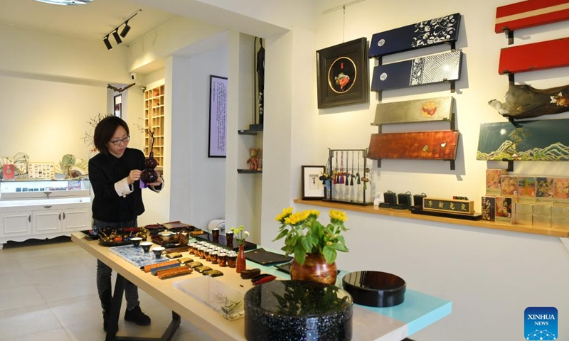 A studio for lacquer specialty artwork of Fuzhou is pictured in Lianjiang Village in Fuzhou, southeast China's Fujian Province, June 6, 2024. 