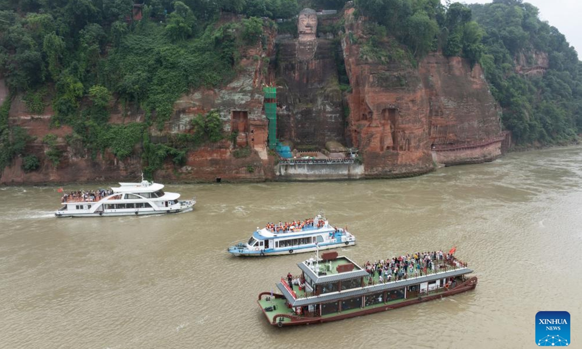 This drone photo shows an archway at the Leshan Giant Buddha scenic area in southwest China's Sichuan Province, June 4, 2024. (Xinhua/Jiang Hongjing)