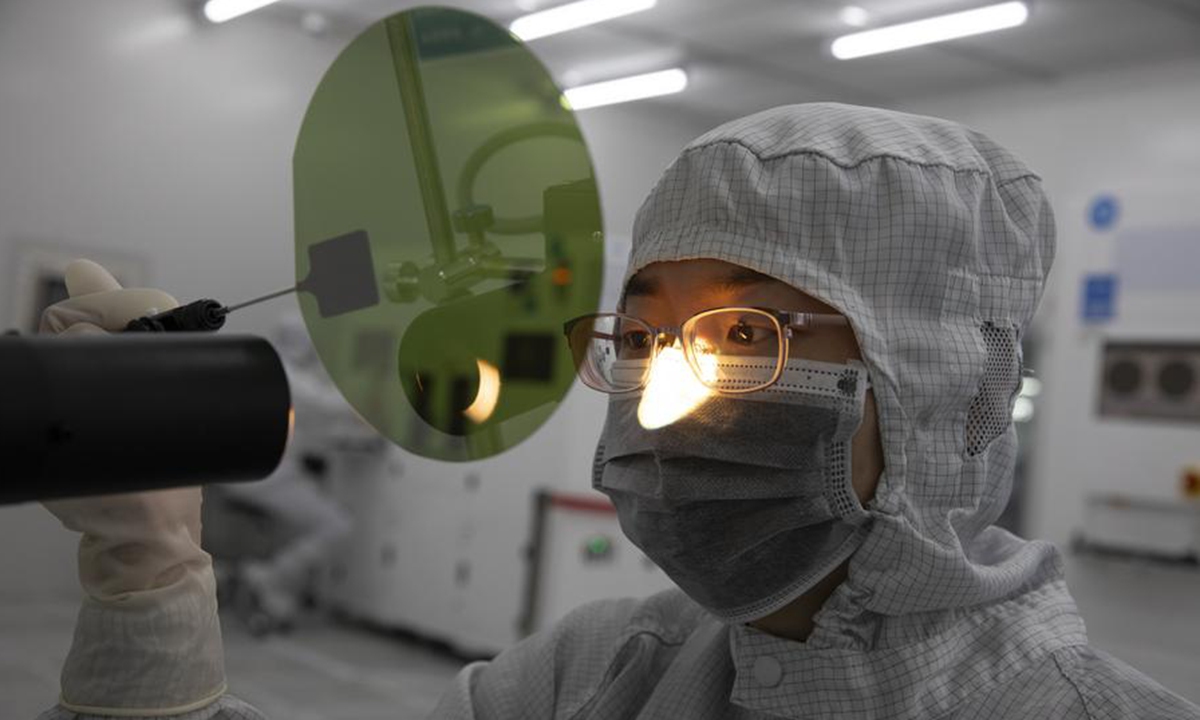 A staff member works at the workshop in the headquarters of TankeBlue Semiconductor Co.,<strong></strong> Ltd. in Daxing District of Beijing, capital of China, Jan. 24, 2024. (Xinhua/Jin Liwang)
