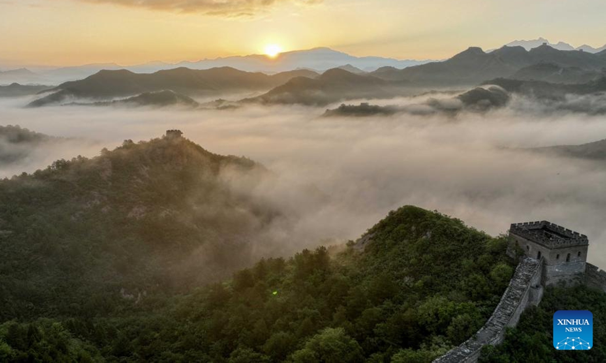 This aerial drone photo taken on June 8, 2024 shows the Jinshanling section of the Great Wall in Luanping County, north China's Hebei Province. (Photo by Zhou Wanping/Xinhua)


