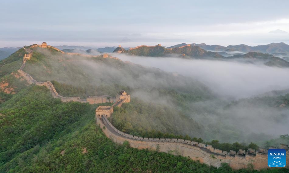 This aerial drone photo taken on June 8, 2024 shows the Jinshanling section of the Great Wall in Luanping County, north China's Hebei Province. (Photo by Zhou Wanping/Xinhua)


