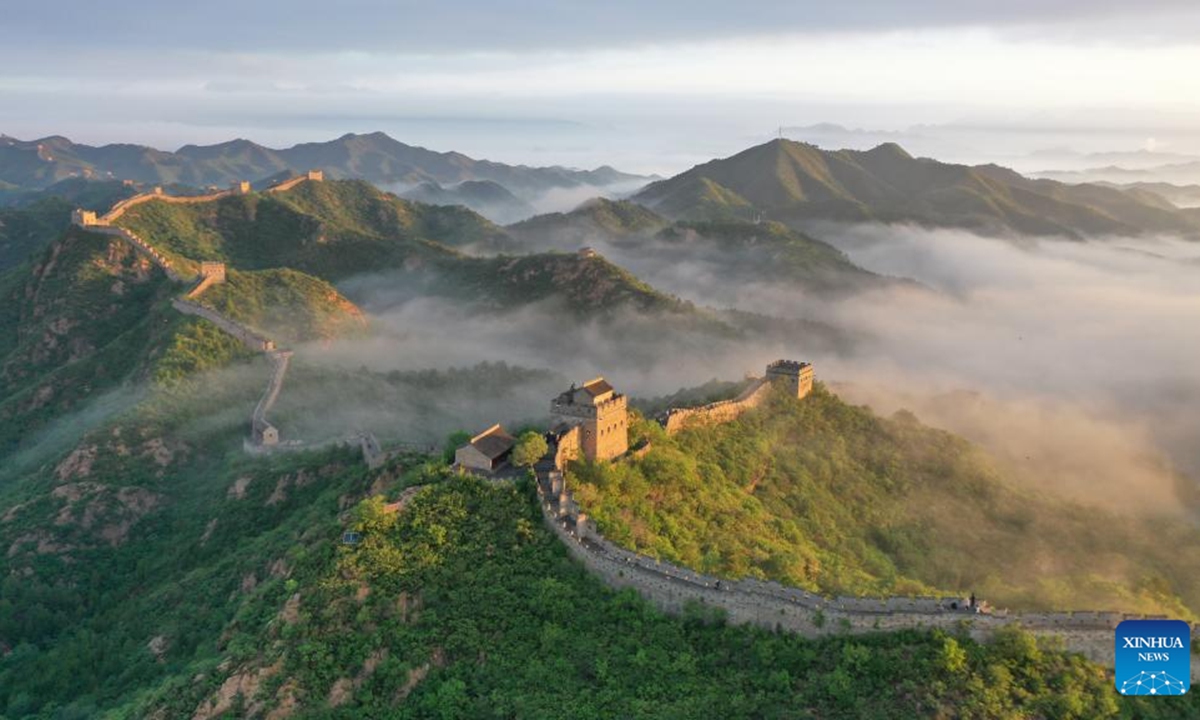 This aerial drone photo taken on June 8, 2024 shows the Jinshanling section of the Great Wall in Luanping County, north China's Hebei Province. (Photo by Zhou Wanping/Xinhua)


