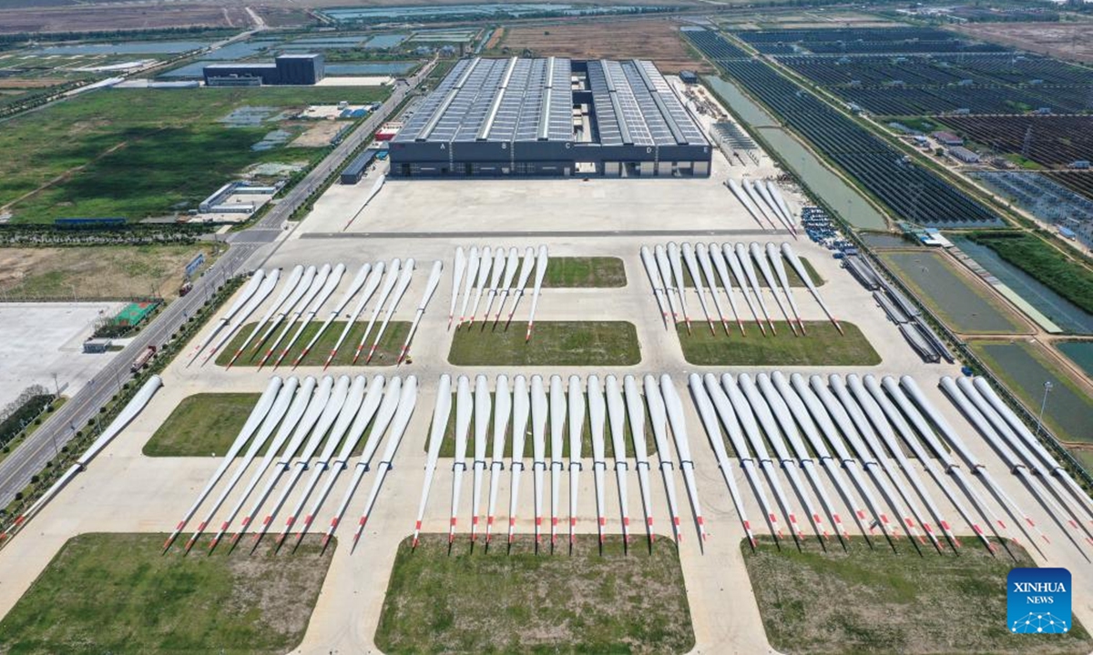 An aerial drone photo taken on June 6, 2024 shows the exterior view of a wind power turbine blades company at a low(zero) carbon-dioxide emission industrial park in Sheyang, Yancheng, east China's Jiangsu Province. (Xinhua/Yang Lei)


